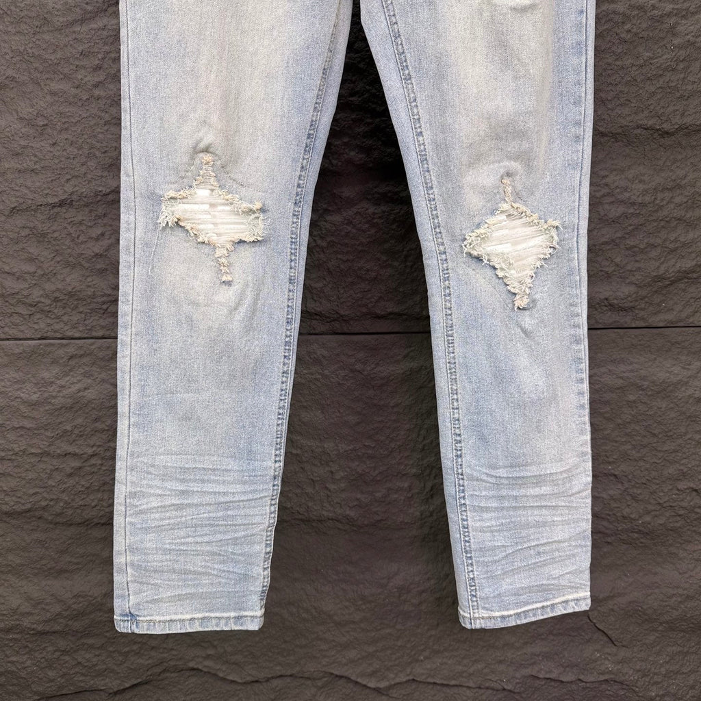 AMIRI White Ribbed Patch Distressed Slim‑Fit Denim Jeans